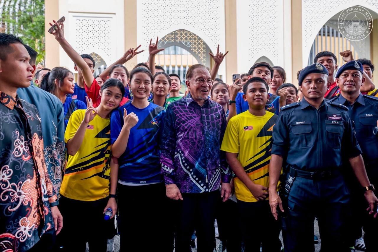 emas pertama olimpik