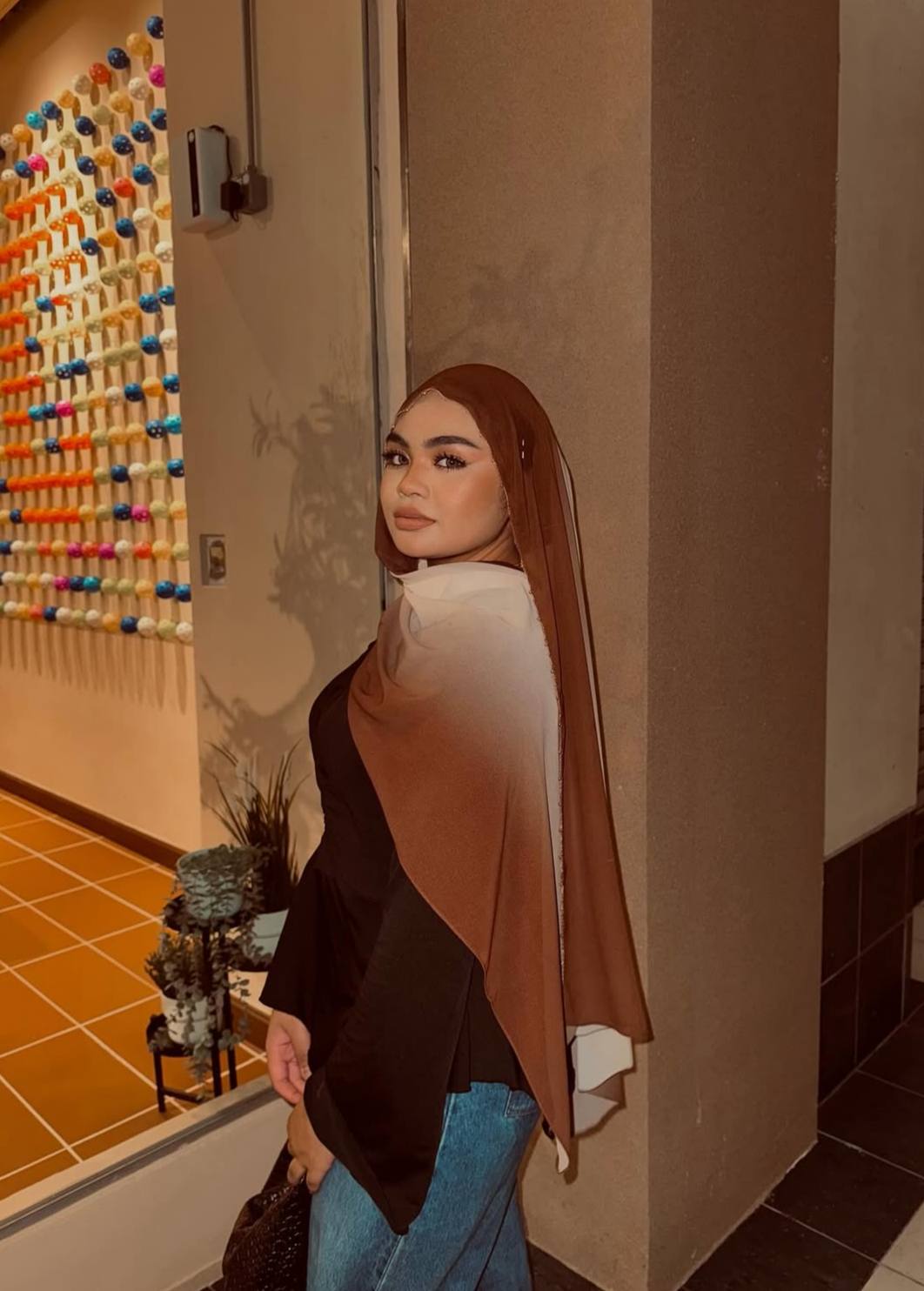 Umai kini berhijab
