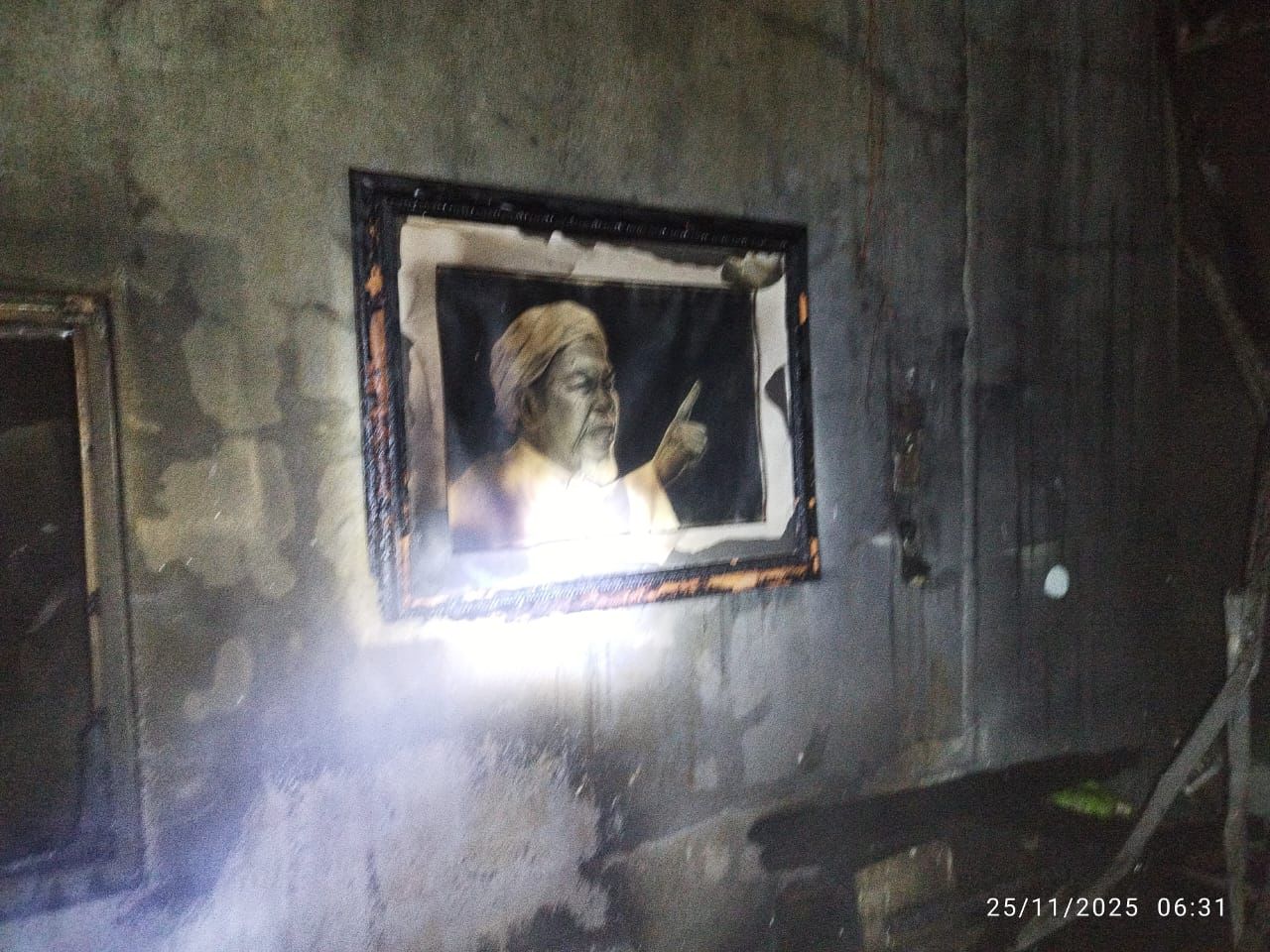 Lukisan arwah Tok Guru Nik Aziz